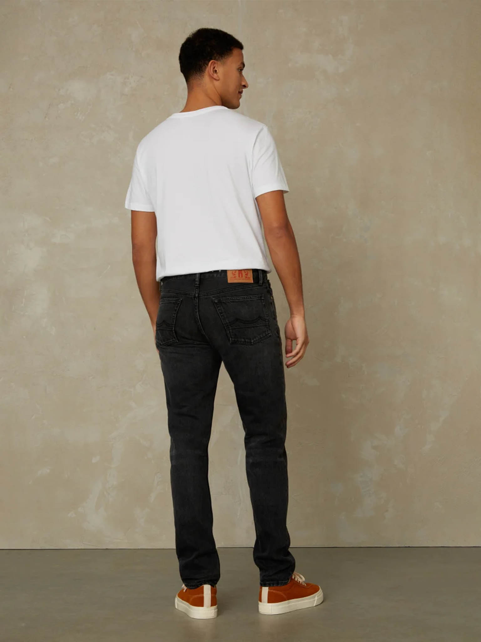Kings of Indigo Jerrick Recycled Night Jeans on model from behind