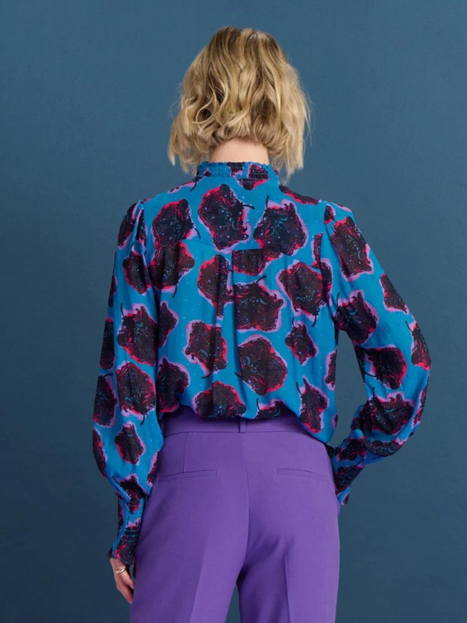 POM Amsterdam Flower Pop Blue Shirt from the Back paired with purple trousers