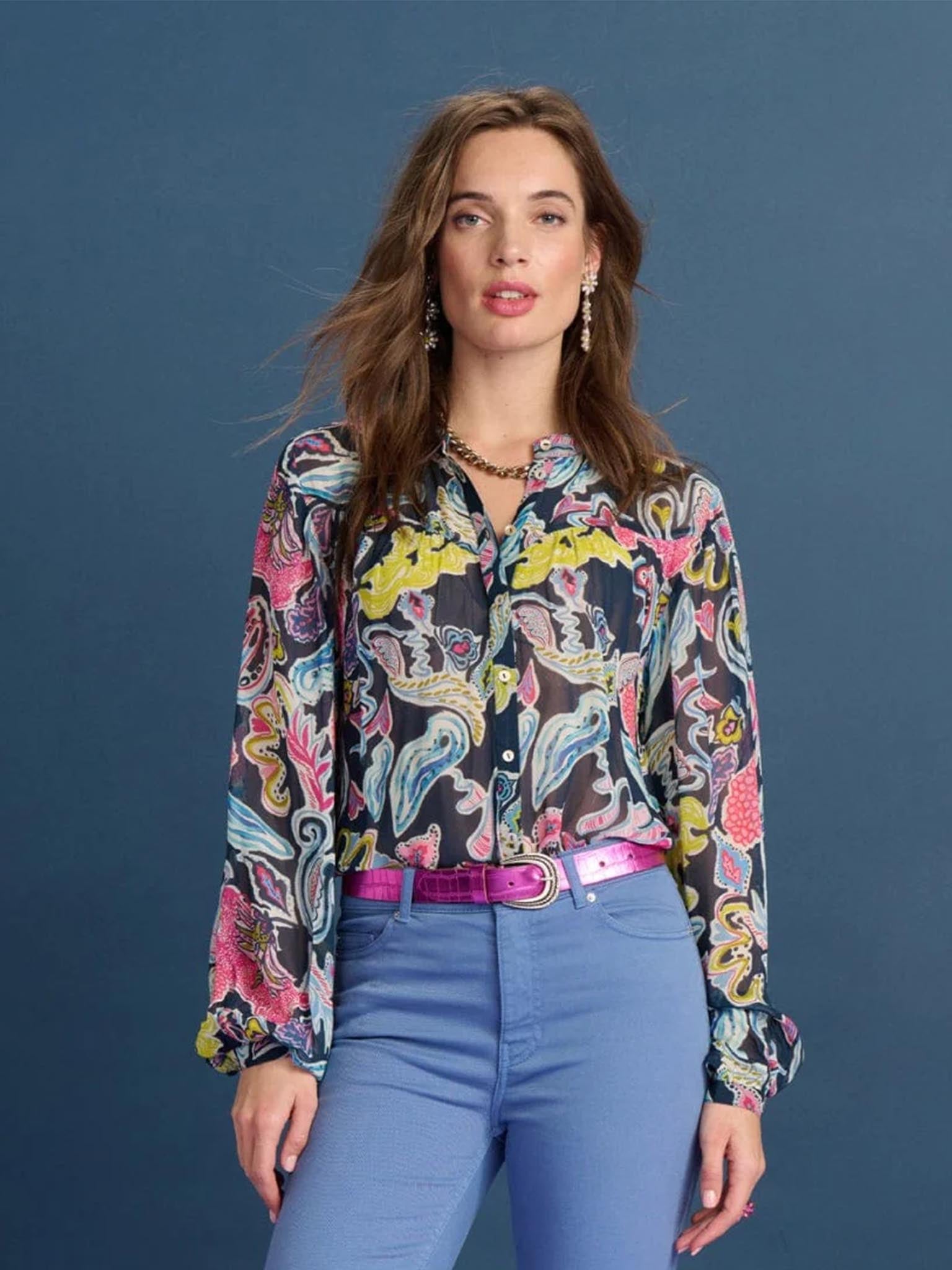 POM Amsterdam Full Glow Deep Blue Blouse from the front on a model paired with light blue jeans